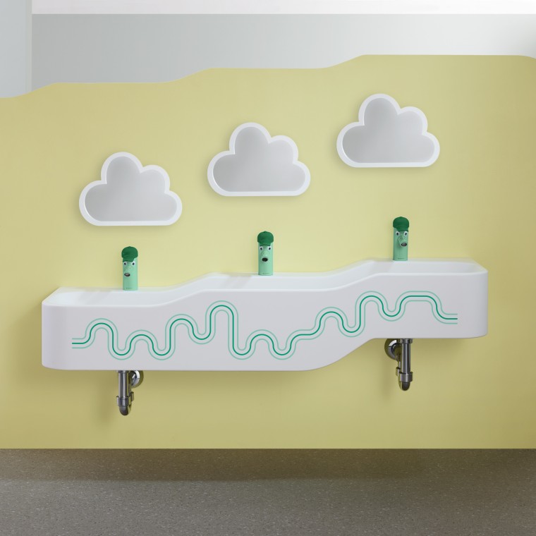 Geberit Bambini orman yeşili ve açık yeşil renkte oyun ve tuvalet alanı Geberit Bambini orman yeşili ve açık yeşil renkte oyun ve tuvalet alanı