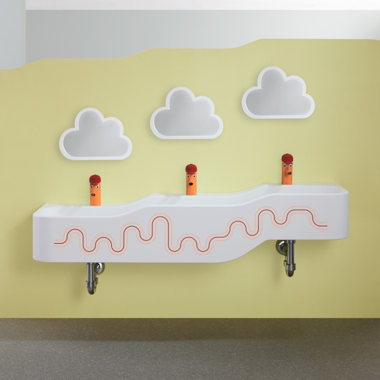 Geberit Bambini karmen kırmızısı ve turuncu oyun ve tuvalet alanı Geberit Bambini karmen kırmızısı ve turuncu oyun ve tuvalet alanı