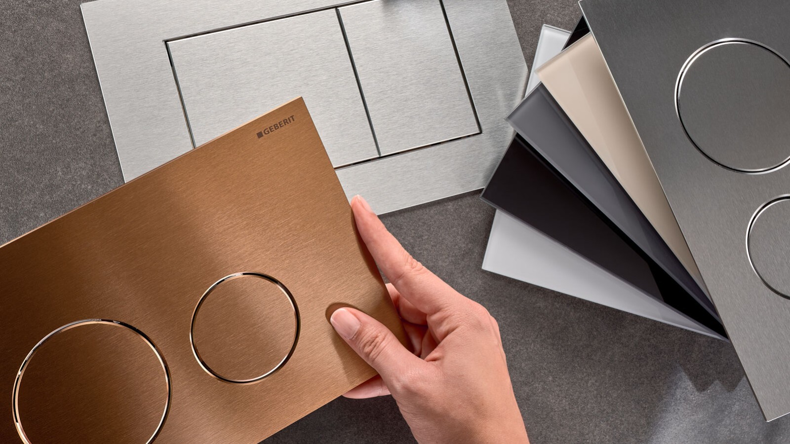 Geberit Sigma40 kumanda kapakları, farklı yüzey ve buton şekillerinde